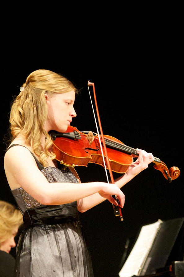 Aaron Harris/ Kansan
Whitney Van Der Kamp, a senior from Centennial, Colo., performs during her viola recital at Swarthout Recital Hall in Murphy Hall. Van Der Kamp performed Saturday evening as part of a graduation requirement where all seniors must perform a recital on their primary instrument or vocal.